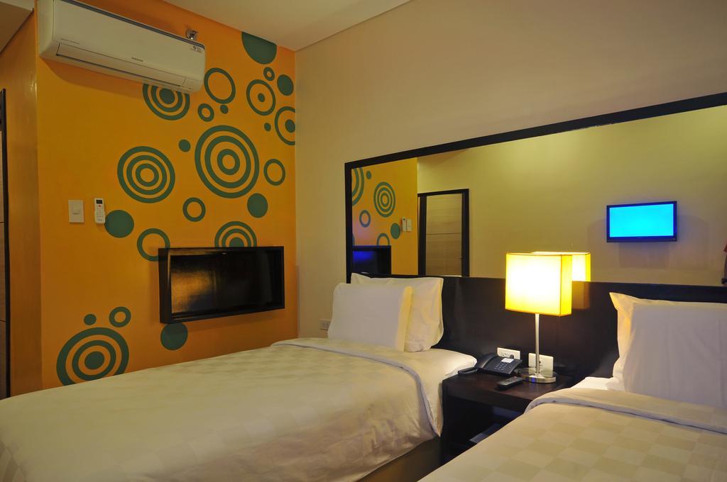 Go Hotels Puerto Princesa Rum bild