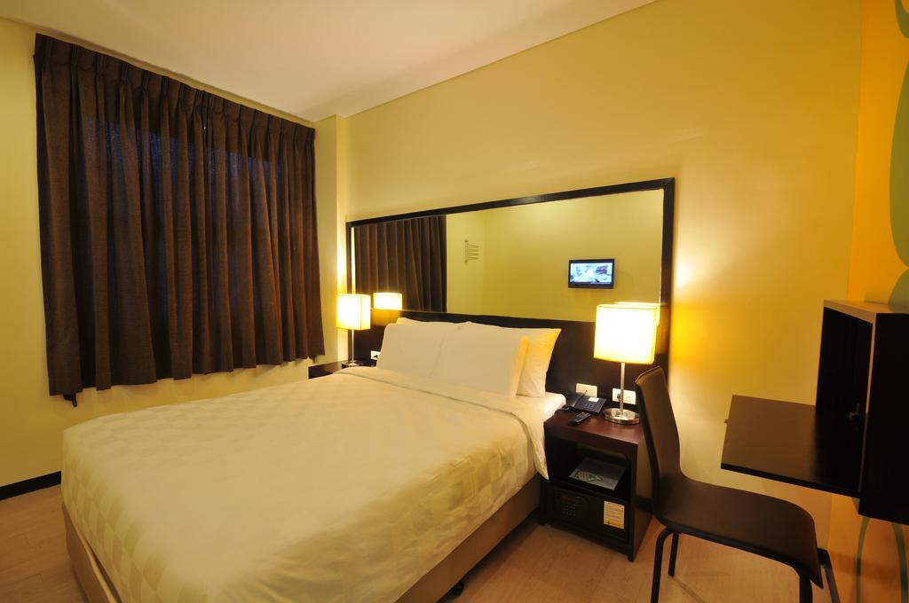 Go Hotels Puerto Princesa Rum bild
